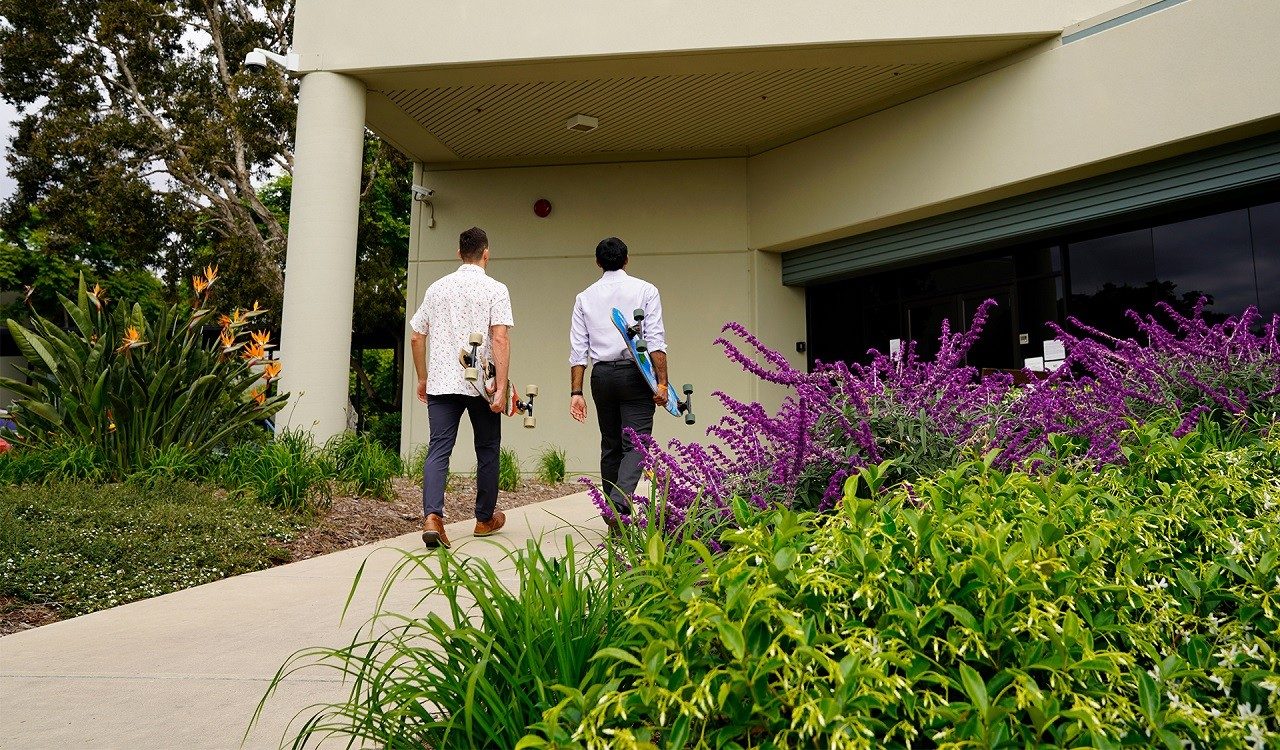 two people walking into the entrance of Santa Barbara Focalplane